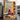Cat in front of window in New York bright colours by Caroline Bonne Müller - Kuriosis Fine Art GmbH