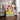 Red Flowers in Yellow Vase by Melissa Donne - Kuriosis Fine Art GmbH