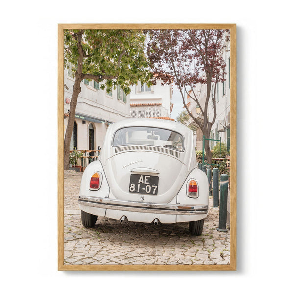 White Car On Cobblestone by Henrike Schenk