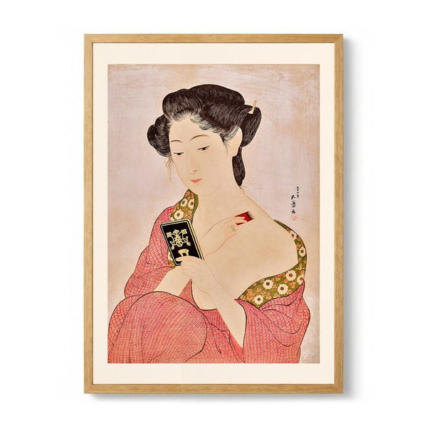 Woman applying powder by Gōyo Hashiguchi