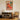Woman with cat in living room with warm earth tones by Caroline Bonne Müller - Kuriosis Fine Art GmbH