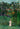 Mujer caminando en un bosque exótico de Rousseau Lámina artística